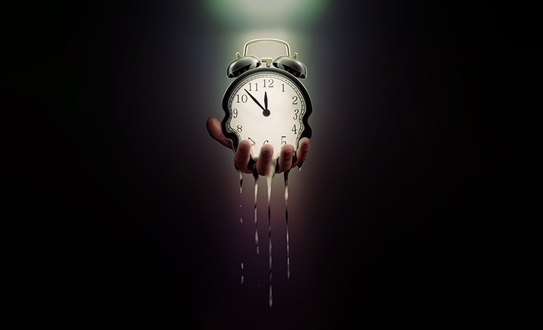 Alarm clock melting in hand