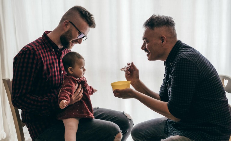 Male couple with baby girl