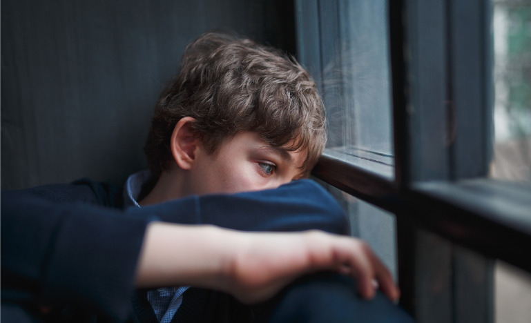 Pensive sad boy