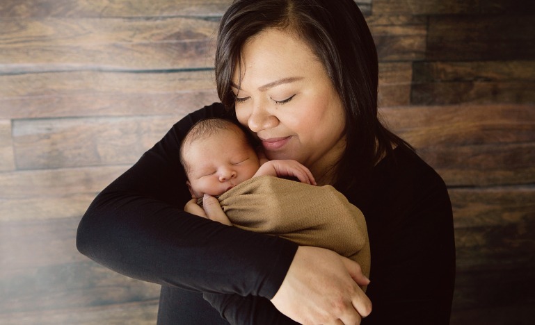 Mother holding newborn