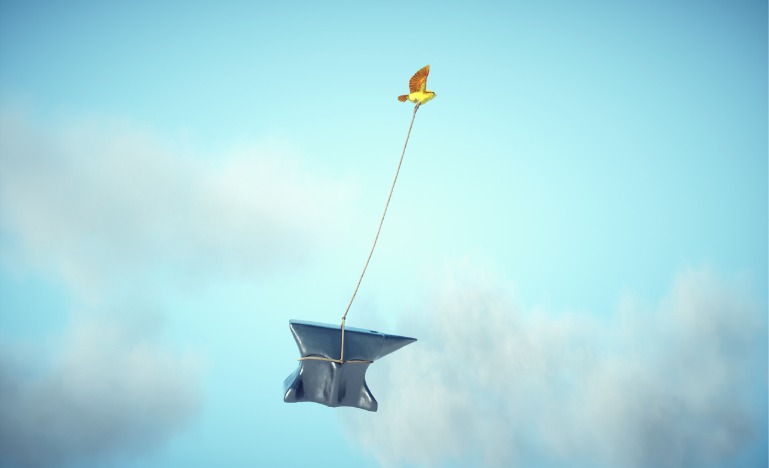 Yellow bird carrying an anvil