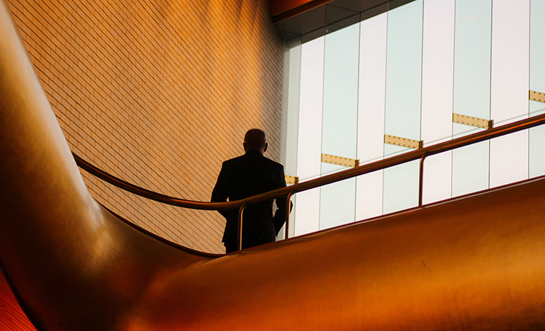 Man looking out of window
