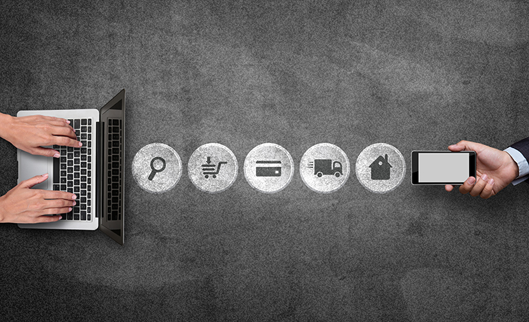 Mobile phone and laptop with online shopping process icons