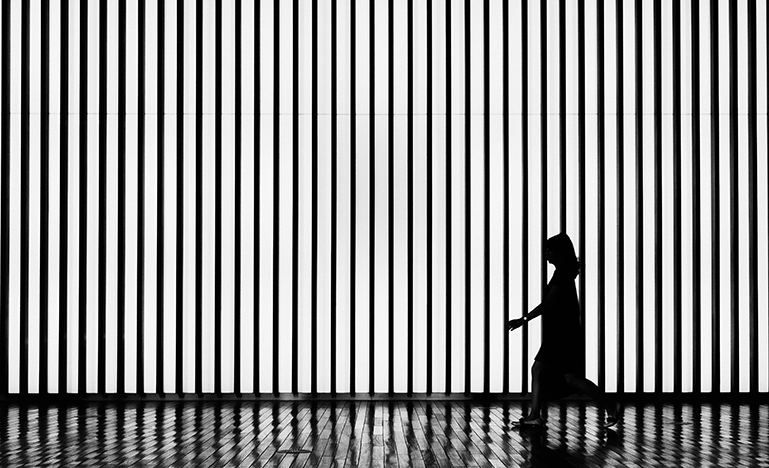 Shillouette of woman walking