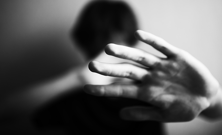 18 years old guy defends himself with his palm isolated