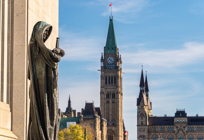 Jucticia with Parliament in background
