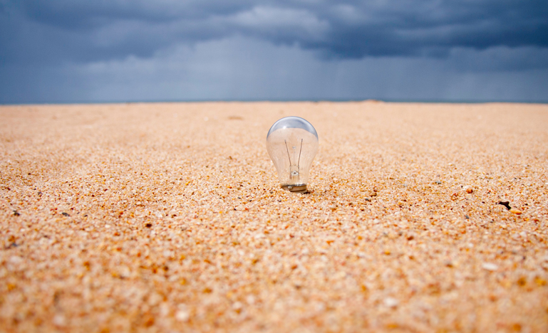 Light bulb in the sand