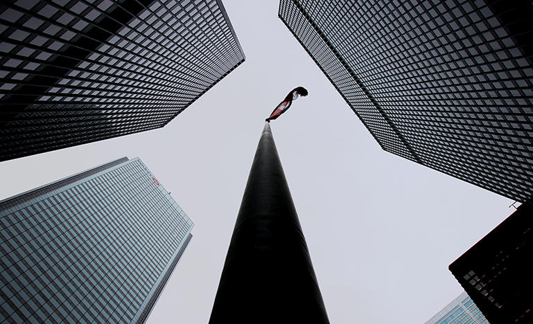 Street view perspective of Canadian flag on flagpole