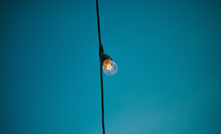 Picture of lightbulb with blue background