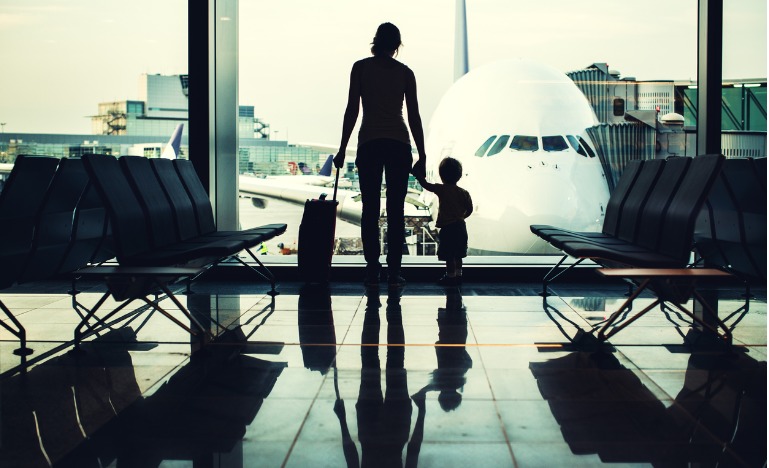 Mother and child at airport