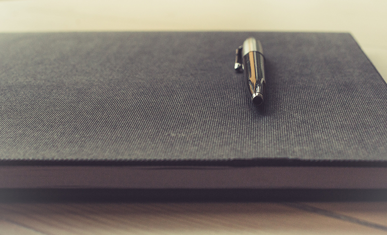 Pen on notebook
