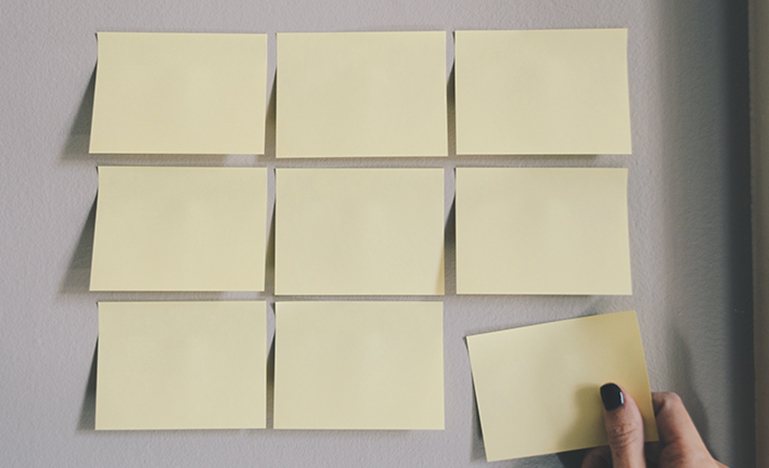Several Post-It Notes on a wall