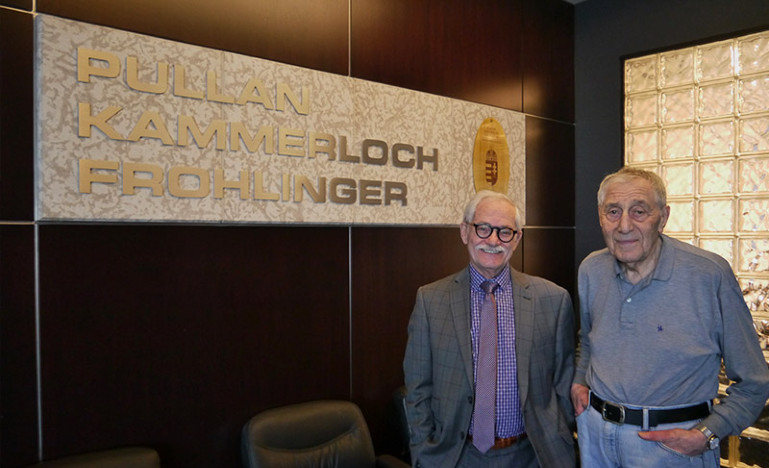 Managing director of PKF Thomas G. Frohlinger stands with Gordon Pullan who has been practising law for seven decades