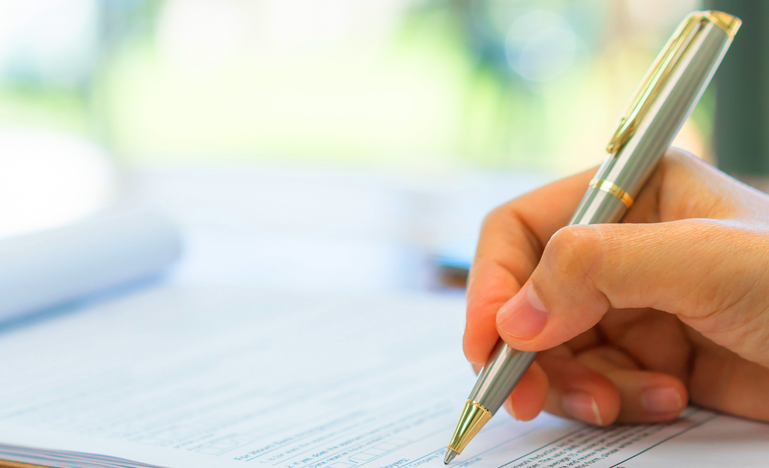 Close up of someone writing