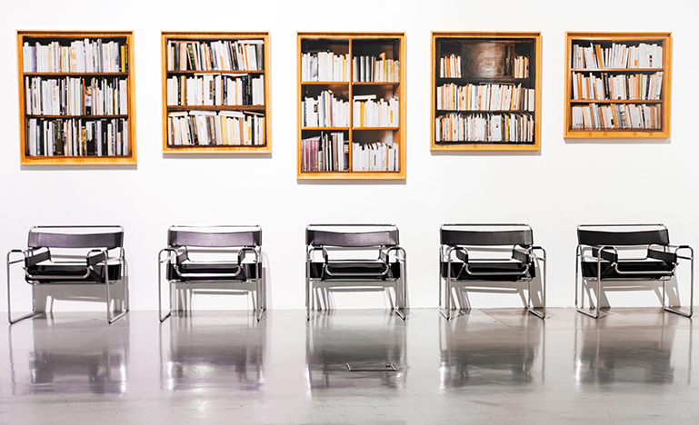 picture of several chairs and photographs of books