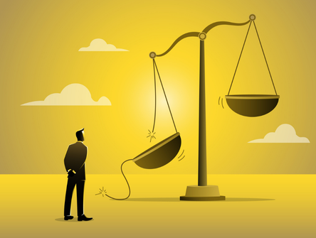 A man looks at a broken scale of justice