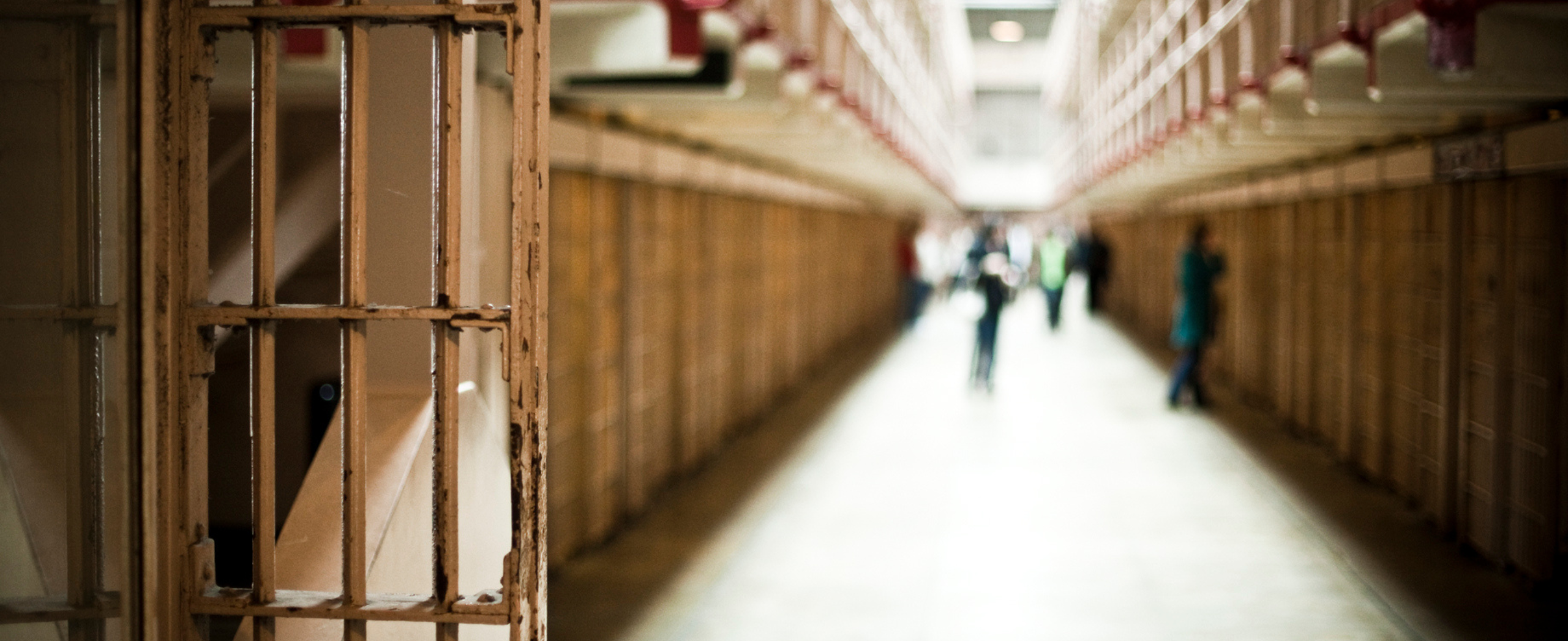 A corridor of prison cells