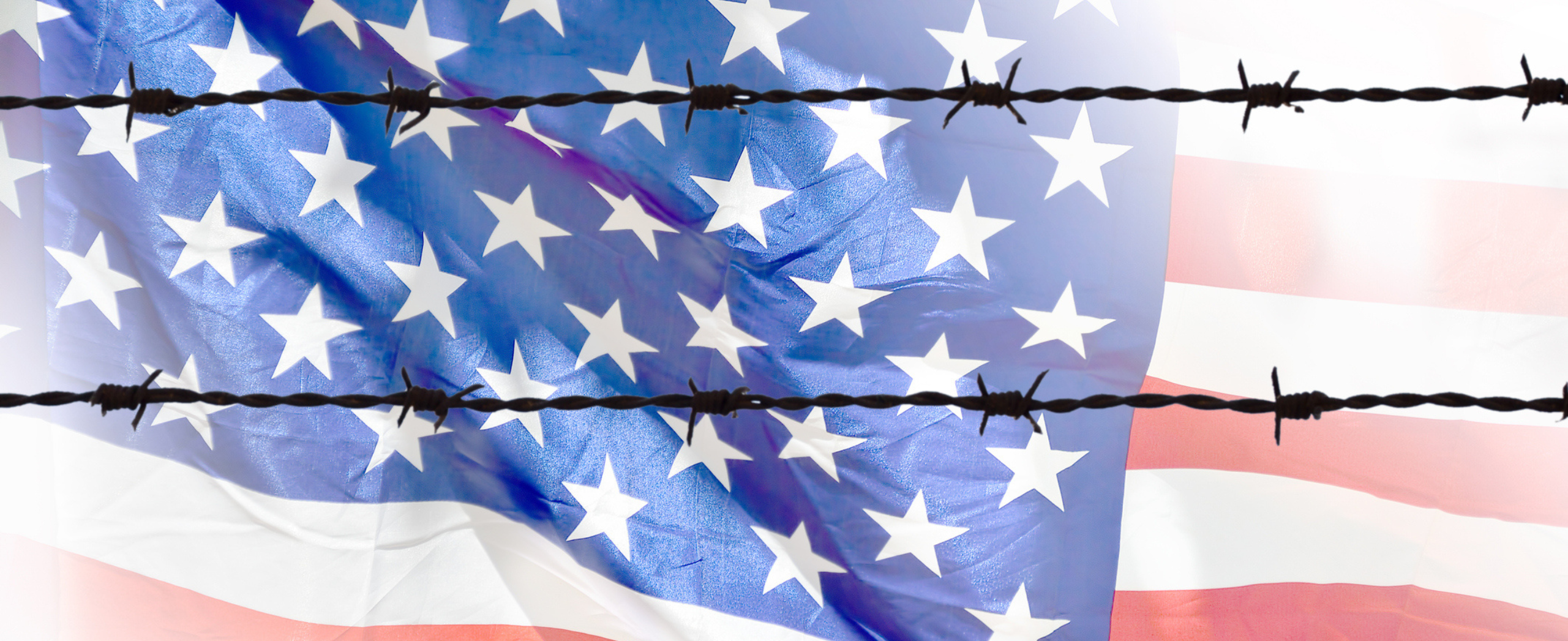 Barbed wire superimposed on an American flag