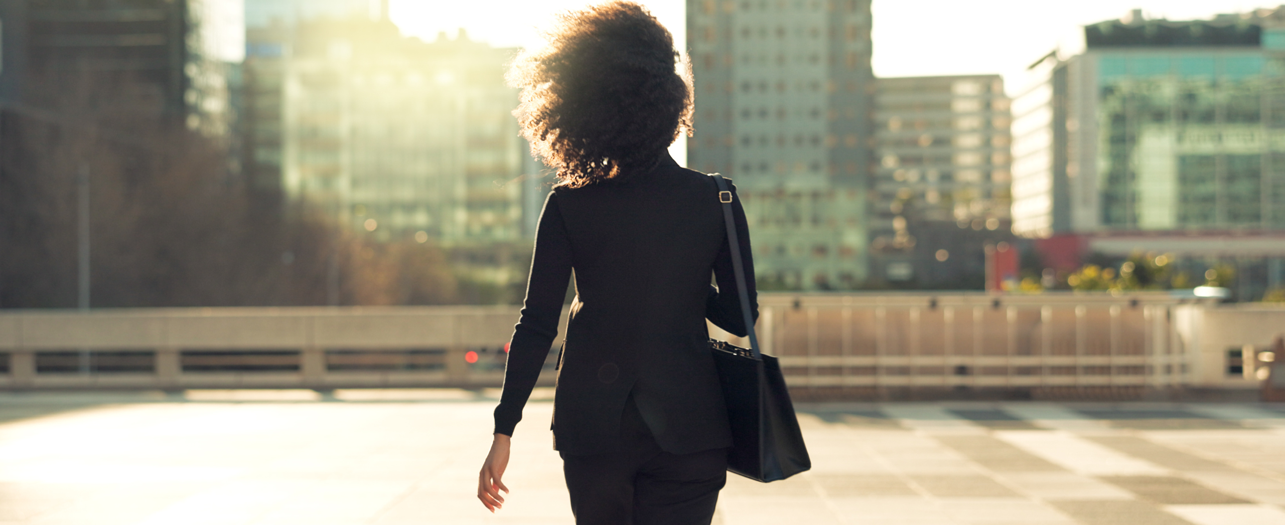 A woman leaves a downtown law firm