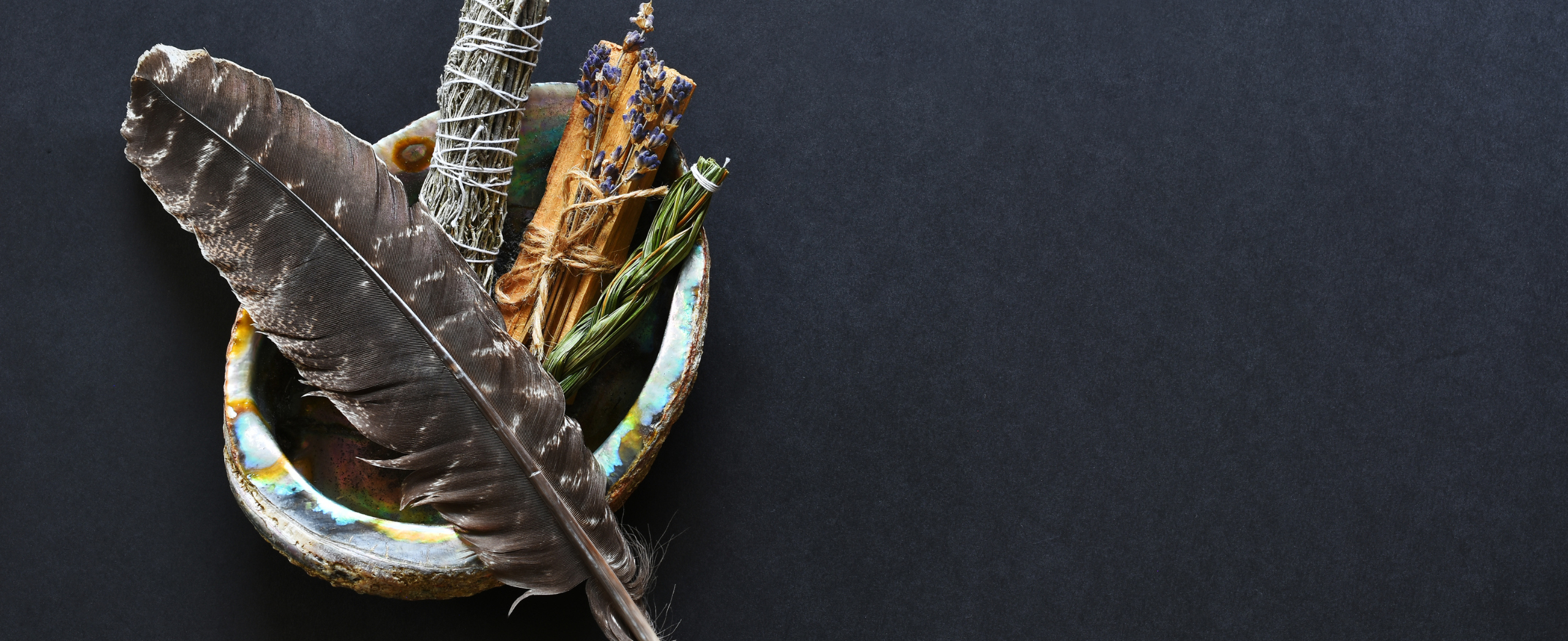 A spiritual smudge kit and eagle feather