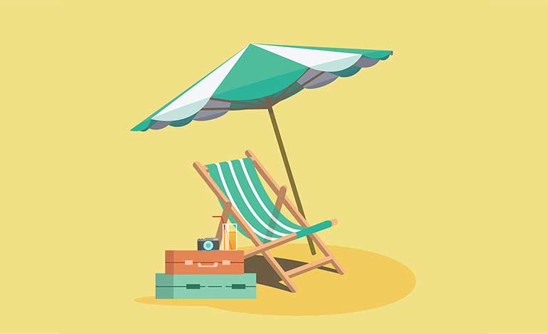 An umbrella and chair on a beach