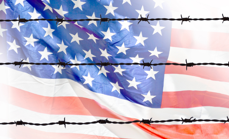 Barbed wire superimposed on an American flag