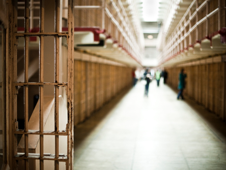 A corridor of prison cells