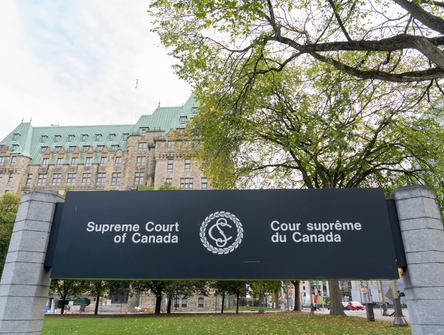 A sign on the lawn of the Supreme Court of Canada