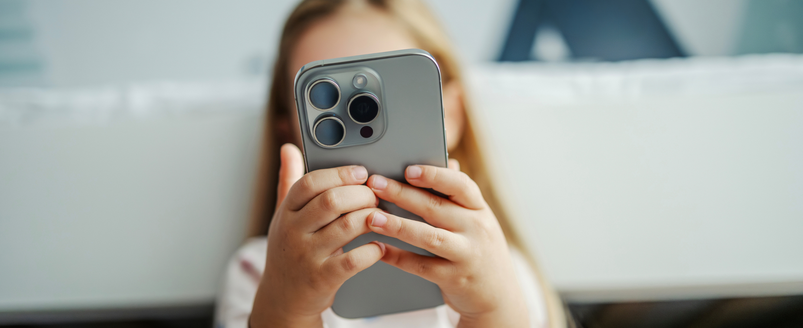 A child on a smartphone